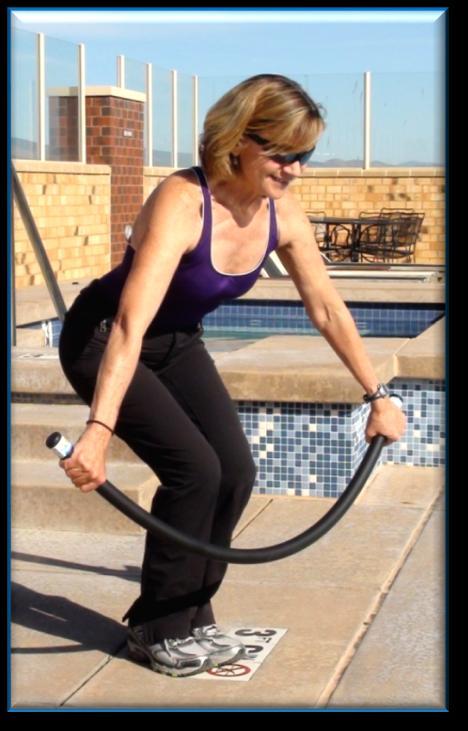 Jump Rope Squat, with a neutral spine, and place the AquaFLEX Bar horizontally in front of the knees, grabbing each end with palms
