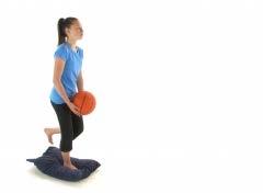 4.3 Throwing and catching a ball standing on a pillow Starting position: Stand on one leg on a balance disk or pillow facing a wall and holding a ball in your