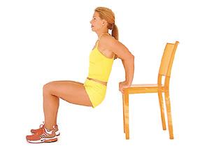 Repeat, alternating legs, for a total of Dip: Sit on the edge of a sturdy chair, hands grasping the seat on either side of your rear.