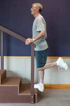 ECCENTRIC CALF STRETCH (bilateral): Patient stands on step with heels unsupported.