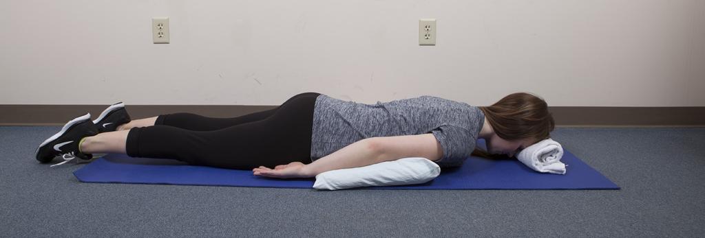 Upper back lift or back extension: This exercise strengthens your back and spine muscles. Lie on your stomach face down on the floor with a pillow under your stomach and hips.