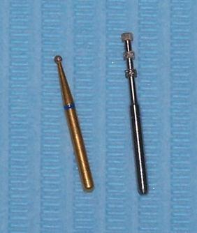 Figure 1. Selection of burs which may be used to accurately plan levels of tooth reduction. The use of optical magnification in other medical disciplines is by no means a novel concept.