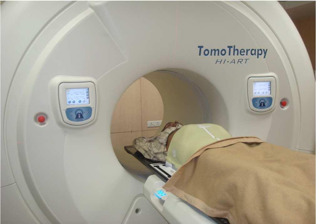 HELICAL TOMOTHERAPY : IMRT with Mega Voltage CT Imaging STATE-OF-THE-ART IMAGE GUIDED RADIATION THERAPY Initial