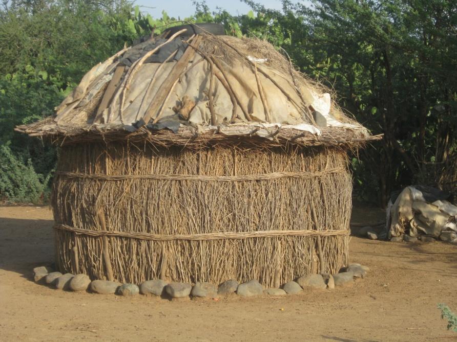 The Kenyans often lived in very primitive conditions. Huts, like the one depicted above, were typical homes for families consisting of as many as 14 members.