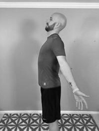 Forward Head Posture - Chest Stretches: Recovery Posture Start: Stand tall. Chest up. Arms at side.