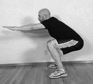 Finish: Squat down, pushing your butt back and your weight over your feet.