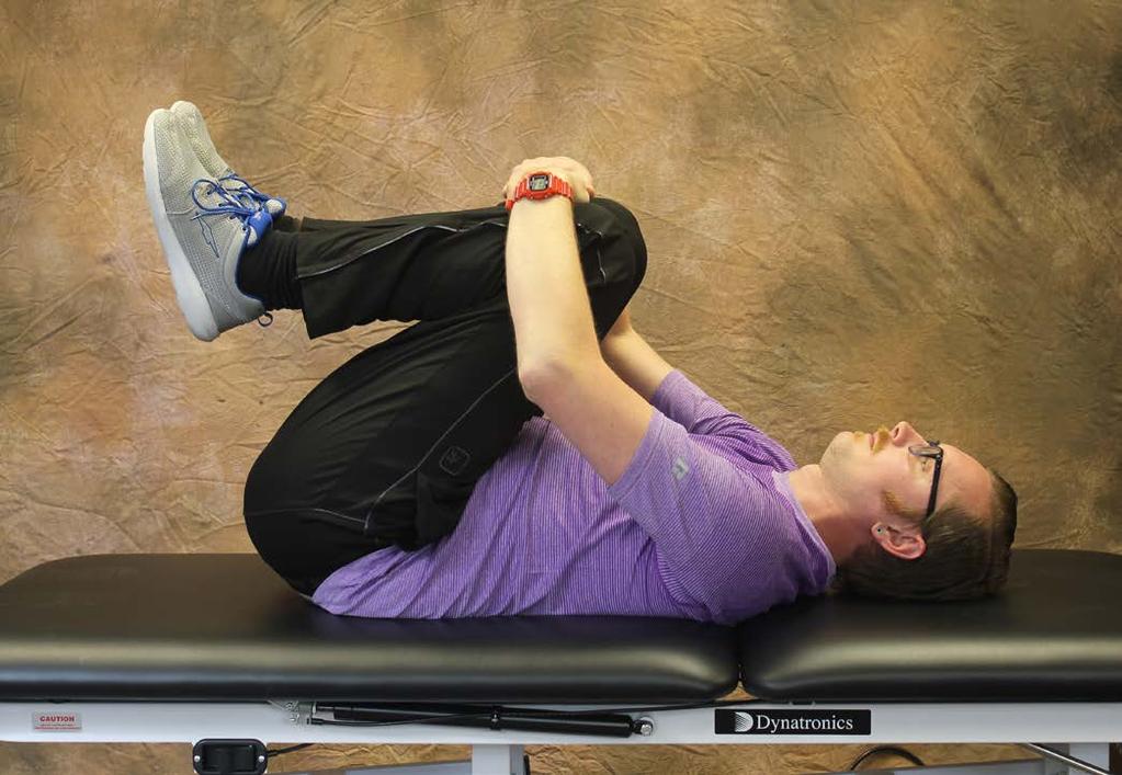Lower Trunk Rotation Tip: Make sure that your back and shoulders stay in contact with the floor.