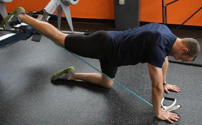 Without resting, thrust your pelvis back into the air and repeat.
