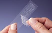 The strips are made of 9-µm polyethylene and embossed with small reservoirs 0.13 cm in diameter and 0.015 cm in depth.