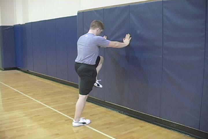 8.3 WALL MARCH ISOMETRIC HOLD Purpose To improve hip extension, and learn the difference between hip motion and lumbar spine motion. To activate the gluteals in a unilateral fashion.