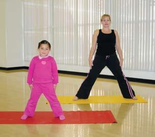 4 Breathe out, look over your right hand then bend your right knee to lower yourself into a lunge (C).
