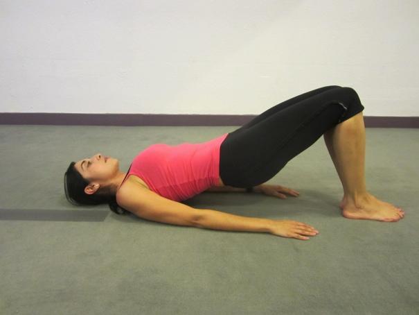 Leg Pulse Reach Lay supine on your back, shoulders pressed down to the floor. Palms face down; press the heel of the palm firmly into the floor. Bend both knees and place the feet flat on the floor.