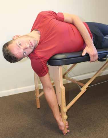 Neck Side Lying Lateral Flexion A. Side lying with arm hanging over table, head lowered. B. Side lying, head lifted toward ceiling.