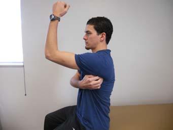 Keep the top of the shoulder, neck, and chest as relaxed as possible. Use your opposite hand to resist motion at the shoulder blade to improve performance.