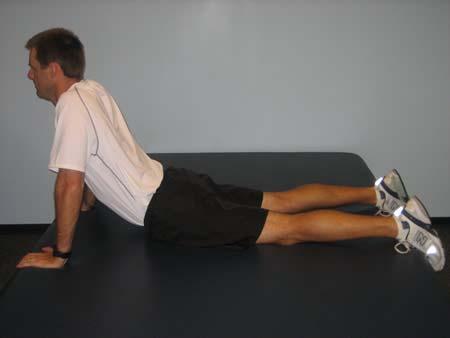 Use your arms to push up, allowing your elbows to fully extend at the end of the motion.