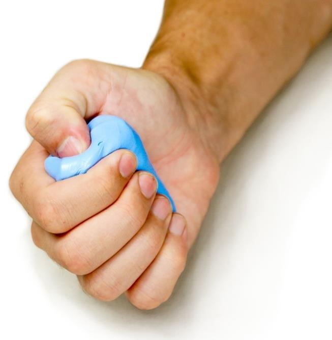 Putty Thumb Flexion Place the putty in your hand as shown and press the tip of your thumb