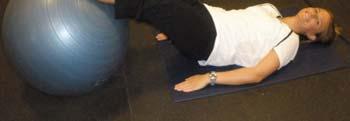 Hamstring Curl on Ball (double leg) Lie on your back with your hands by your sides.