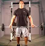 Wide Grip Standing Barbell Curl Equipment: Barbell Tips: Stand with your feet shoulder width apart and your back