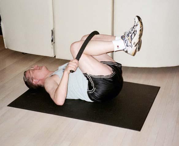 Stretch for Lower Back Lie with the back on the floor and raise the knees toward the chest.