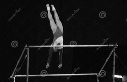 16. Using examples, suggest why team games players need power. [2] 17. The diagram shows a gymnast performing on the asymmetric bars. Identify three components of fitness need for this activity.