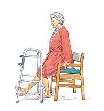 Back your walker up until you feel the chair touching the back of your legs.