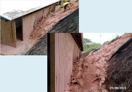 Slope slippage with damage to building