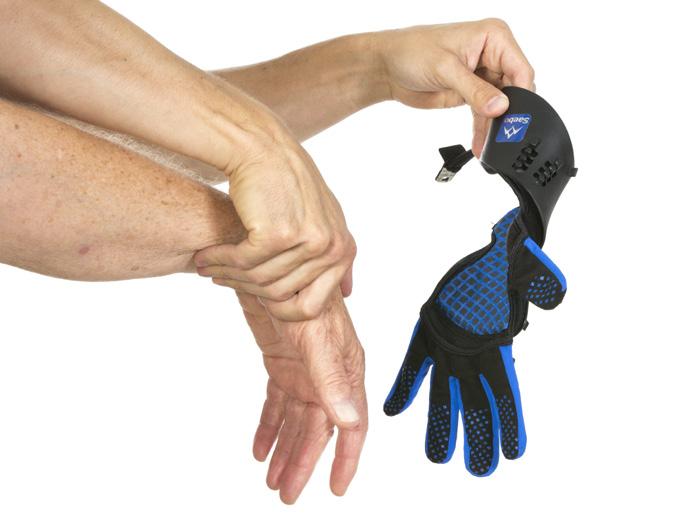 Fitting Procedure Place Fingers and Thumb into Glove Position the wrist into flexion while keeping the