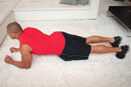 Perfect Plank Assume a pushup position, but rest on your forearms instead of your hands. Keep your back straight.