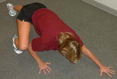 lower back to the floor giving pressure in a downward direction