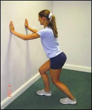 throughout STRETCH: Standing soleus Adopt a split stance in front of wall with both knees bent Hands contact the wall