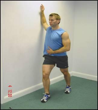 STRETCH: Standing wall assisted pectorals Adopt a stride stance side on to a wall, with a leader leg being