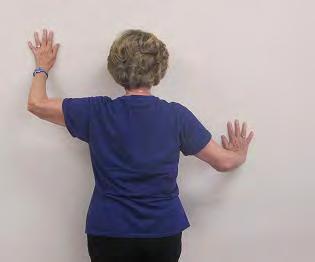 Unequal Wall Push Up: Combo Hands on wall with one hand above chest height & one below,