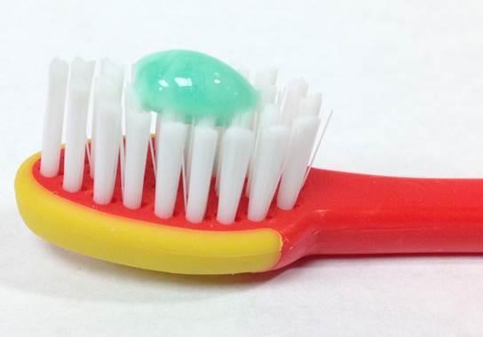 tooth appears, start brushing with an infant s soft-bristled
