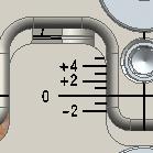 axis. The rotational adjustment knob on the lower portion of the guide is turned to dial in rotation (Figure 8).