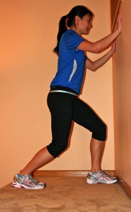 Calf Stretch Option 3 Rest your hands against a sturdy object such as a wall or counter Position the target leg behind you with foot flat on the floor, toes pointing straight ahead and knee