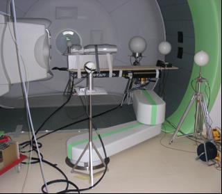 Schematic view of ten measurement positions around a 10-year-old paediatric phantom and experimental setup with Bonner spheres within the CCB-Krakow gantry
