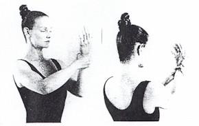 Breathing: Breathe normally. Warm-Up Exercise #4 In a relaxed standing position, hold your arms in front of you.