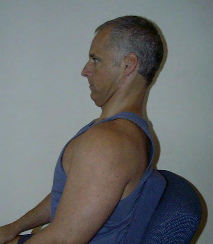 SPECIFIC POSTURAL EXERCISES Head Retraction - Seated Sit straight in a chair