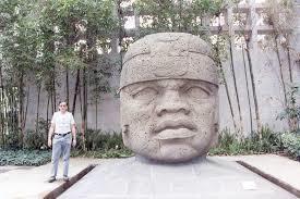 3. The Colossal Heads In groups: Look at SH_1.2 and answer the following questions: A. These heads are sculpted monuments. What do you think they commemorate? B.