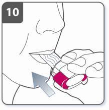 Breathe out completely 10. Hold the inhaler by the white base. 11.