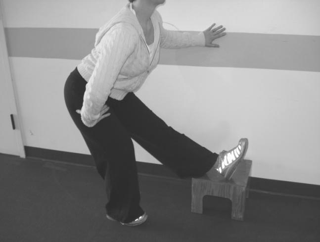 pain/discomfort Ø Repeat to stretch the opposite thigh 4) Hamstring Stretch Ø Using a wall or table for support, stand sideways to it Ø Put all of your body weight on one leg and bend that leg Ø Take