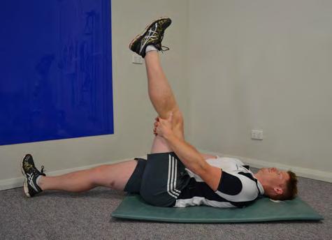 Lying Hamstring Stretch (hold for 15 seconds per leg) Lying on your back with legs out straight, lift one leg and hold behind the knee.