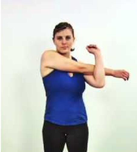 TRANSVERSE SHOULDER STRETCH 1. From a seated or standing position, begin by lifting one arm and reaching across, as if to hug yourself. 2.