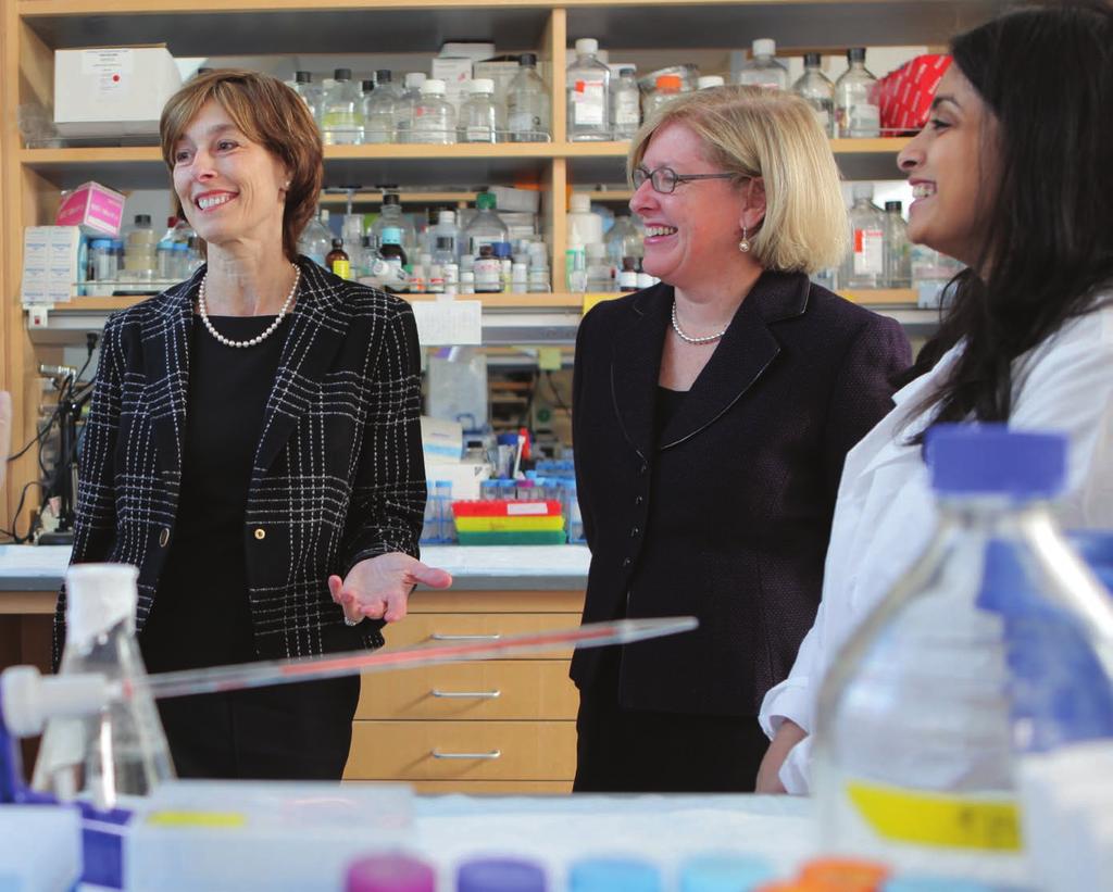 A physician first and foremost : Laurie Glimcher, MD, visits the lab of Barbara Hempstead, MD, PhD (second from right), the associate dean for faculty development.