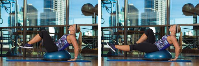 Inhale and draw the legs back over your torso or head (your hips will lift off the dome).