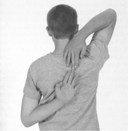 The Cooper Institute, Fitnessgram/Activitygram: Test Administration Manual, Human Kinetics (p. 55) Figure 4-1-9 Right Shoulder Stretch 2.
