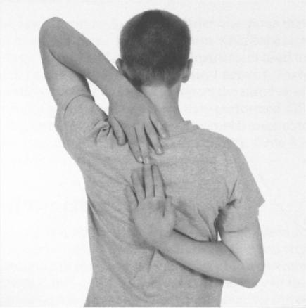 reaching with the left hand over the left shoulder and down the back; and b. reaching with the right hand behind the back to touch the left hand (as illustrated in Figure 4-1-10).