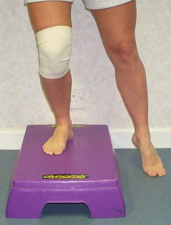 As your knee regains strength, aim to slide further down until your hips and knees are at right angles.
