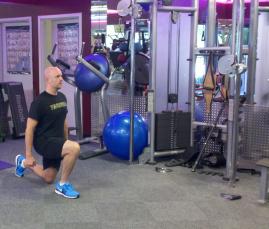 Switch Lunge Burpee Stand with your feet shoulder width apart, holding dumbbells at your sides (optional).