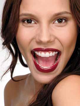 Lindy s face radiates joy and vitality again: The thin veneers out of all-ceramic material look beautiful and natural.